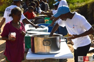  Pictured: Samukelo Dlamini serving meals to children.